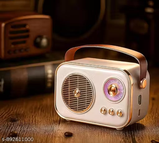 Vintage-style portable radio on a wooden surface with a blurred background
